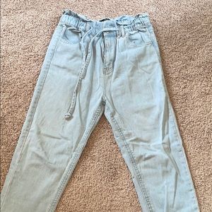 High waisted light blue jeans